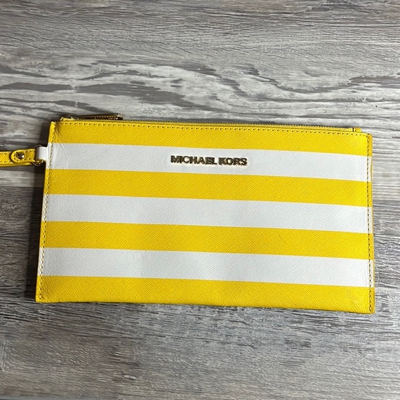 Michael Kors Handbags - Michael Kors yellow wristlet